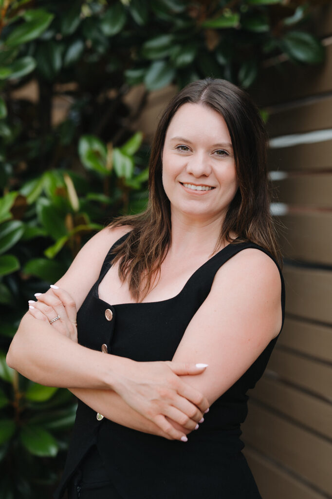 Amy Mich, lead planner at The White Rose Co, poses for a headshot