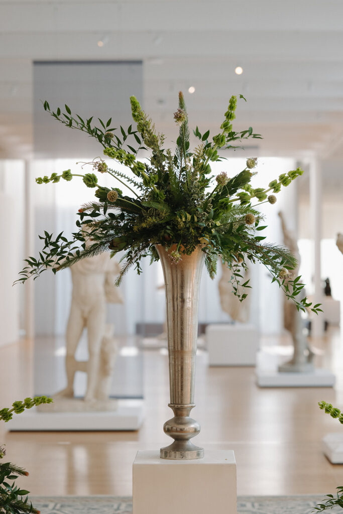floral installation at a wedding ceremony at the ncma in raleigh, north carolina